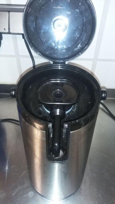 coffee jug with pumping rod